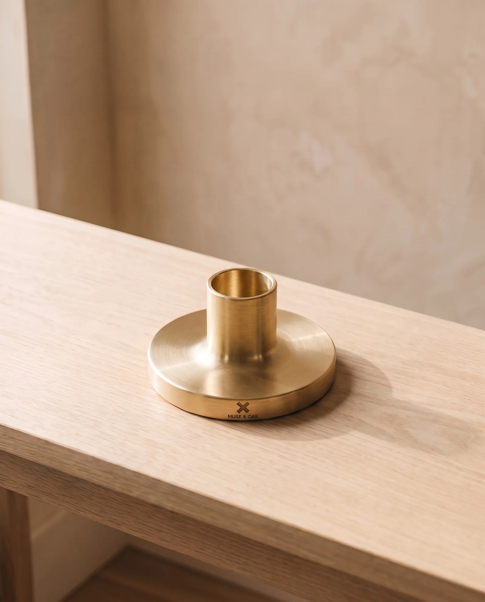 Taper Holder — Solid brass, low and wide.