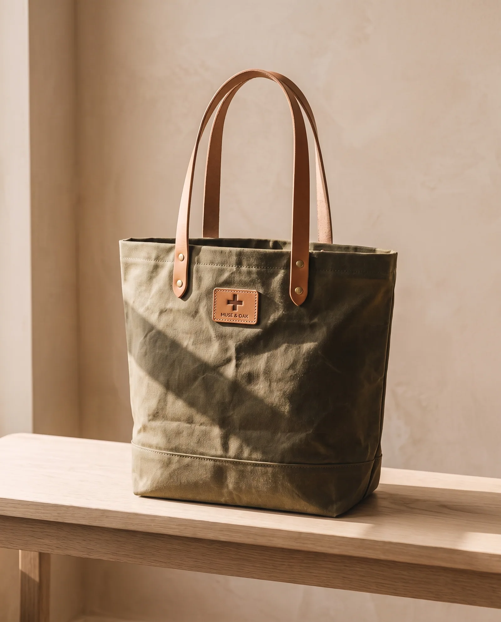 Waxed Tote — Waxed cotton, leather handles.